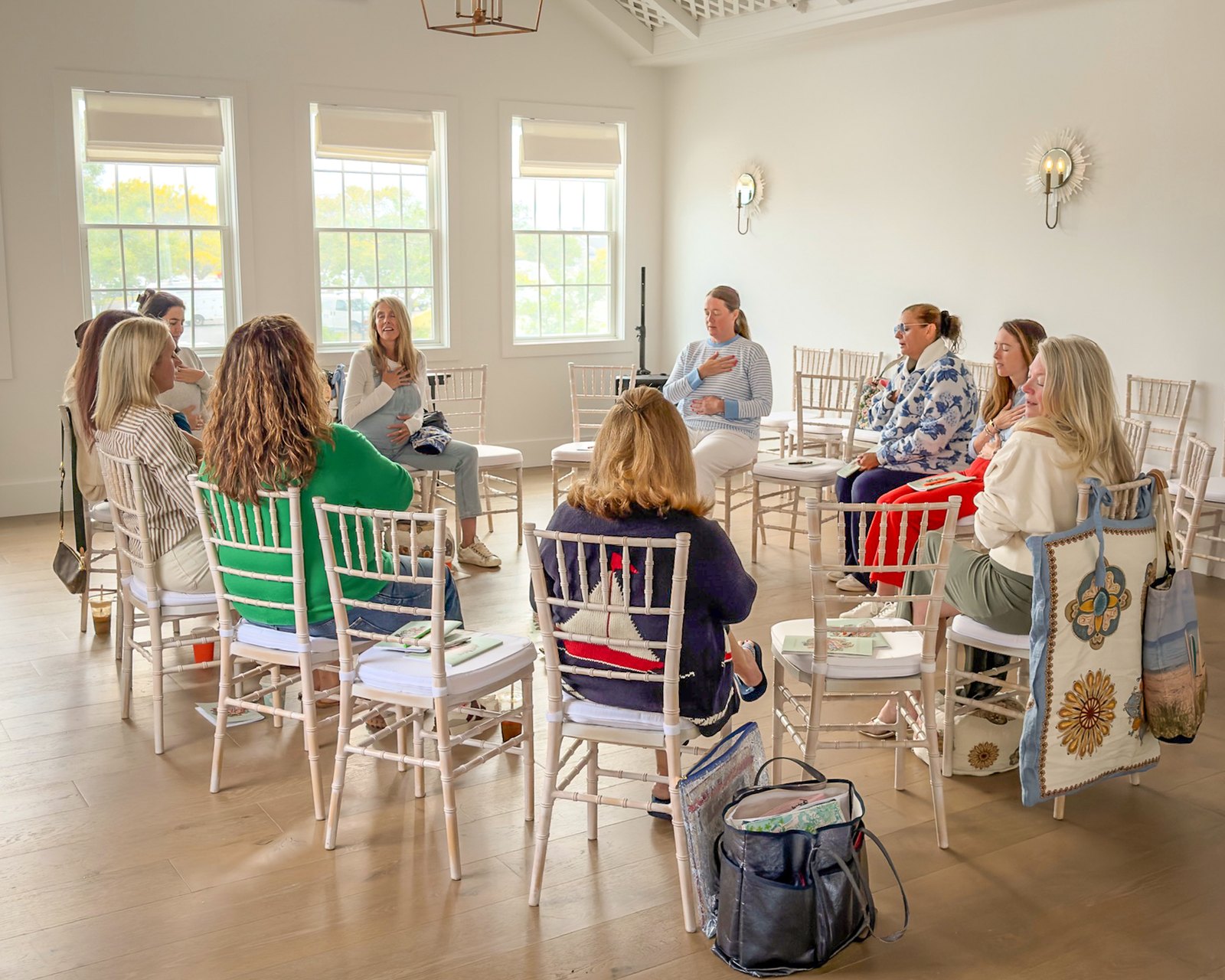A THREADS meditation circle in a light-filled event room at Nantucket Inn