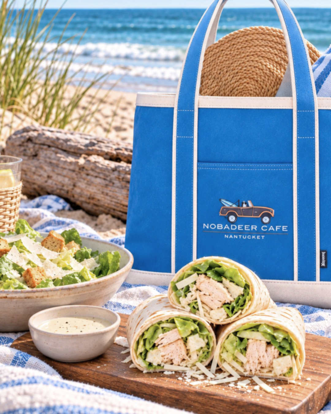 A Nobadeer Cafe picnic of Caesar wraps and salad on a Nantucket beach